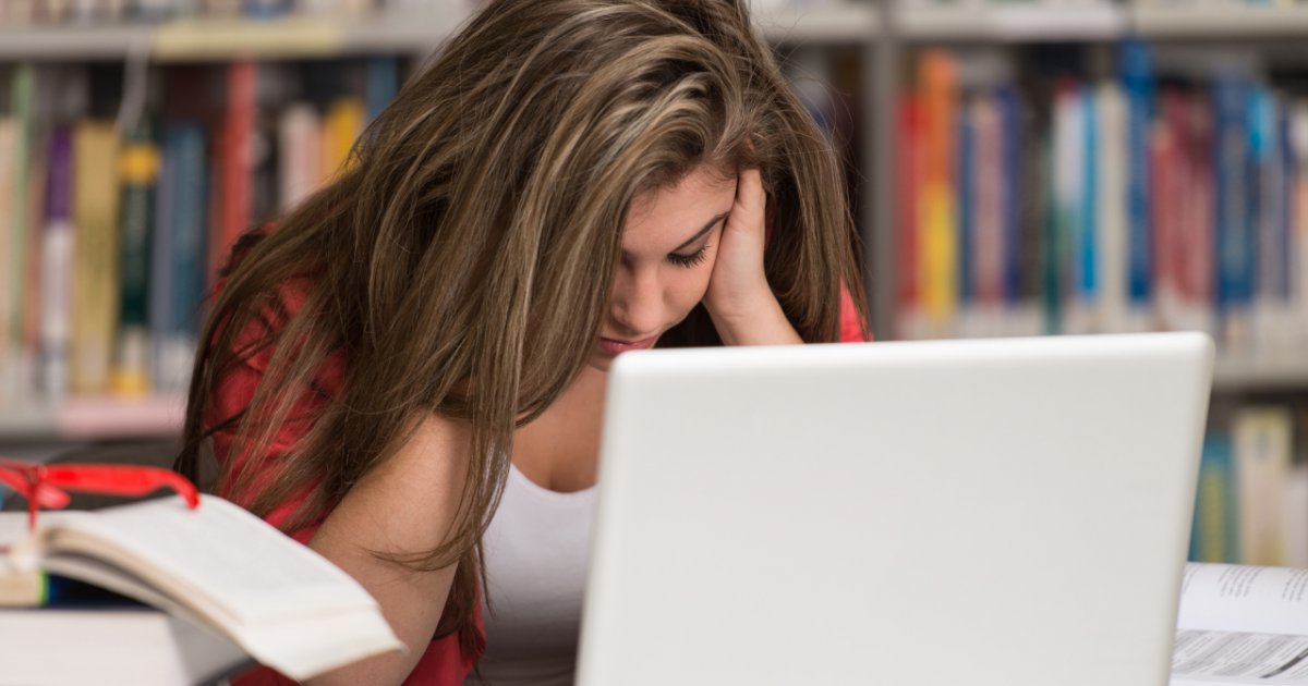 She started her homework. Student stressing over Exam stock photo.