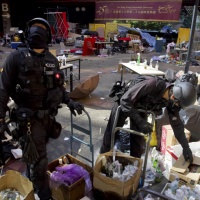 Hong Kong: la Cina minaccia contromisure dopo la firma di Trump