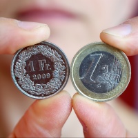 Cambio euro-franco, nuovo minimo storico